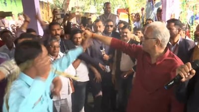 Chhattisgarh CM Bhupesh Baghel getting whiplashed as part of a ritual.