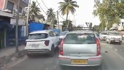 Car rams into bikers in Bengaluru (PTI) Car rams into bikers in Bengaluru (PTI)