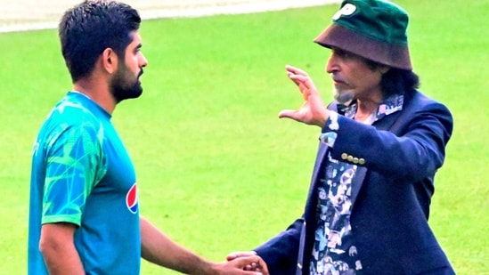 Pakistan captain Babar Azam and former Pakistani cricketer Ramiz Raja in a conversation during a practice session (ANI)