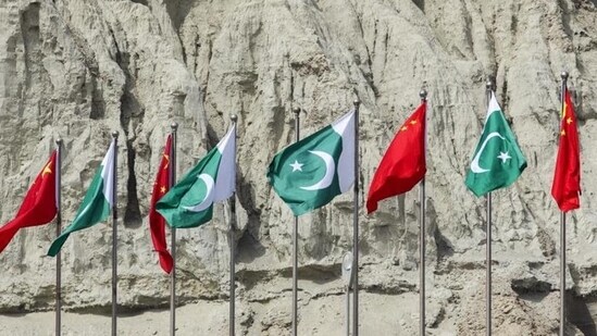 China’s national flags fly next to Pakistan’s national flags at the Gwadar port in Balochistan. (Bloomberg)