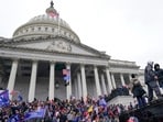 FILE - Rioters loyal to President Donald Trump stand on vehicles and the steps of the U.S. Capitol on Jan. 6, 2021, in Washington. Jason Donner, a former Fox News producer says in a lawsuit filed Monday, Nov. 13, 2023, he was targeted and fired for pushing back against false claims about the riot at the U.S. Capitol on Jan. 6. Donner said he was part of a “purge” of employees who refused to report information that would please Trump and his supporters. Donner was inside the Capitol during the riot and pressed his complaints about the networks coverage for months(AP Photo/Julio Cortez, File) FILE - Rioters loyal to President Donald Trump stand on vehicles and the steps of the U.S. Capitol on Jan. 6, 2021, in Washington. Jason Donner, a former Fox News producer says in a lawsuit filed Monday, Nov. 13, 2023, he was targeted and fired for pushing back against false claims about the riot at the U.S. Capitol on Jan. 6. Donner said he was part of a “purge” of employees who refused to report information that would please Trump and his supporters. Donner was inside the Capitol during the riot and pressed his complaints about the networks coverage for months(AP Photo/Julio Cortez, File)
