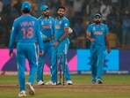India's Mohammed Siraj, second right, celebrates with teammates after the dismissal of Netherlands' Sybrand Engelbrecht India's Mohammed Siraj, second right, celebrates with teammates after the dismissal of Netherlands' Sybrand Engelbrecht