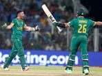 South Africa batter Keshav Maharaj and Tabraiz Shamsi celebrate after winning the ICC Men's Cricket World Cup 2023 match against Pakistan South Africa batter Keshav Maharaj and Tabraiz Shamsi celebrate after winning the ICC Men's Cricket World Cup 2023 match against Pakistan