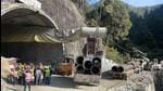 Big dimeter pipe is being pushed into the collapsed part of the tunnel to make way for the trapped labourers to come out.