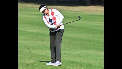 A player in action during Day one of 29th Punjab Open Ladies Amateur Golf Championship being held at Chandigarh Golf Club on Tuesday. (Keshav Singh/HT)