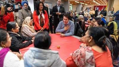 Canadian Prime Minister Justin Trudeau meets seniors from the Indian International Seniors Club in Brampton, Ontario, Canada, November 13, 2023. (Reuters)