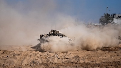 Israel-Hamas War: Israeli military vehicle manoeuvres during the ongoing ground operation of the Israeli army against Hamas, in the Gaza Strip. (Reuters)