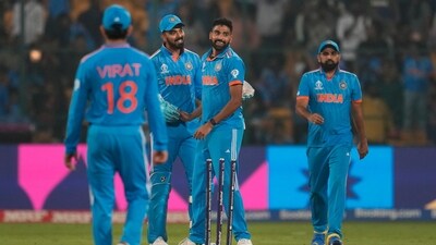 India's Mohammed Siraj, second right, celebrates with teammates after the dismissal of Netherlands' Sybrand Engelbrecht (AP) India's Mohammed Siraj, second right, celebrates with teammates after the dismissal of Netherlands' Sybrand Engelbrecht (AP)