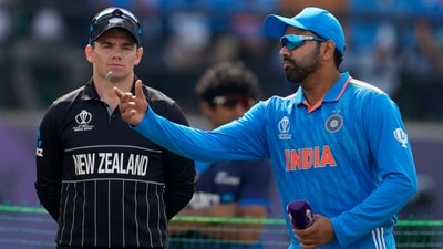 New Zealand's stand-in captain Tom Latham, left, watches as India's captain Rohit Sharma spins the coin at the toss (AP) New Zealand's stand-in captain Tom Latham, left, watches as India's captain Rohit Sharma spins the coin at the toss (AP)