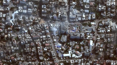 Damage arround the Shifa Hospital in Gaza City's al-Rimal district. More than 10,000 people have been killed in relentless Israeli bombardment of the Gaza Strip. (AFP) Damage arround the Shifa Hospital in Gaza City's al-Rimal district. More than 10,000 people have been killed in relentless Israeli bombardment of the Gaza Strip. (AFP)