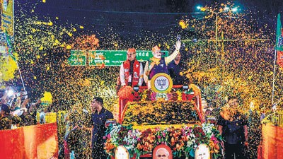 Prime Minister Narendra Modi during a roadshow in Indore on Tuesday. (ANI) Prime Minister Narendra Modi during a roadshow in Indore on Tuesday. (ANI)