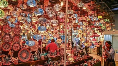 2. Accentuate colours with lights - Festive decoration and lights are synonymous, not just in India but all around the world. The floral arrangements can be further accentuated by the placement of diyas. While led strips and artificial diyas will also do, a natural earthen lamp makes a great pair with flowers. The use of diyas and candles accompanied with flower highlights in certain areas within the house adds warmth to the entire atmosphere. Besides, diyas can be placed in certain corners to create a subtle glow. (Photo: Raajessh Kashyap/HT) 2. Accentuate colours with lights - Festive decoration and lights are synonymous, not just in India but all around the world. The floral arrangements can be further accentuated by the placement of diyas. While led strips and artificial diyas will also do, a natural earthen lamp makes a great pair with flowers. The use of diyas and candles accompanied with flower highlights in certain areas within the house adds warmth to the entire atmosphere. Besides, diyas can be placed in certain corners to create a subtle glow. (Photo: Raajessh Kashyap/HT)
