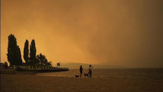 FILE The world is off track in its efforts to curb global warming, a new international report calculates (AP)