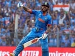 India's Virat Kohli celebrates his century during the World Cup semi-final against New Zealand India's Virat Kohli celebrates his century during the World Cup semi-final against New Zealand