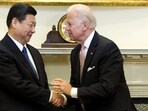 (FILE) US Vice President Joe Biden (R) shakes hands with Chinese President Xi Jinping (FILE) US Vice President Joe Biden (R) shakes hands with Chinese President Xi Jinping