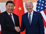 US President Joe Biden (R) and China's President Xi Jinping (L) shake hands. US President Joe Biden (R) and China's President Xi Jinping (L) shake hands.