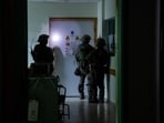Israeli soldiers inspect the Al Shifa hospital complex, amid their ground operation against Palestinian Islamist group Hamas, in Gaza City, November 15, 2023.