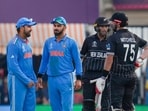 New Zealand batters Daryl Mitchell and Rachin Ravindra, India's Rohit Sharma and Virat Kohli during World Cup 2023 match between India and New Zealand New Zealand batters Daryl Mitchell and Rachin Ravindra, India's Rohit Sharma and Virat Kohli during World Cup 2023 match between India and New Zealand