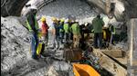 Rescuers near the collapsed part of the tunnel in Uttarkashi. (HT Photo)