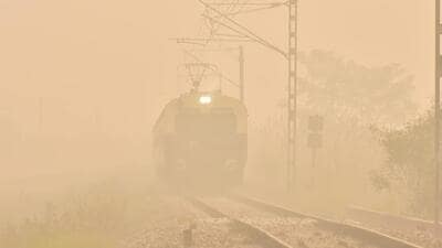 A passenger train makes its way through the thick smog on Wednesday morning in Ghaziabad, which saw the highest AQI of 378 when compared to Noida (360) and Greater Noida (338) on Wednesday. (Sakib Ali/HT Photo) A passenger train makes its way through the thick smog on Wednesday morning in Ghaziabad, which saw the highest AQI of 378 when compared to Noida (360) and Greater Noida (338) on Wednesday. (Sakib Ali/HT Photo)