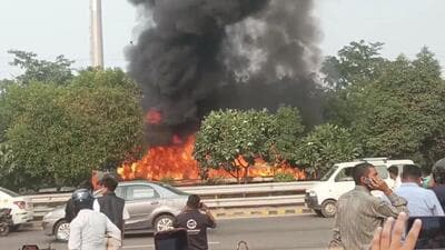 A screen grab from a video of the double-decker bus on fire on Noida-Greater Noida Expressway on Wednesday afternoon. (sourced) A screen grab from a video of the double-decker bus on fire on Noida-Greater Noida Expressway on Wednesday afternoon. (sourced)