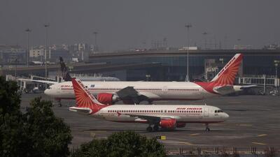 Air India passenger aircraft are seen on the tarmac at Chhatrapati Shivaji International airport in Mumbai, India, February 14, 2023. (REUTERS)