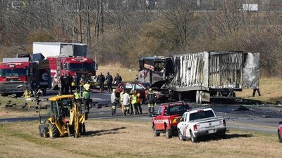 Emergency responders are on the scene of a fatal accident on Interstate 70 West in Licking County, Ohio, Tuesday, Nov. 14, 2023. An emergency official says a charter bus carrying students from a high school was rear-ended by a semi-truck on the Ohio highway. (WSYX/WTTE via AP) (AP)