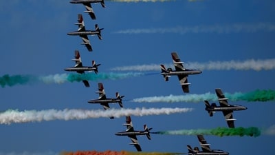 Frecce Tricolori (Tricolor Arrows), the Italian Air Force aerobatic display team, perform during the opening day of the Dubai Air Show, United Arab Emirates, Monday. (AP) Frecce Tricolori (Tricolor Arrows), the Italian Air Force aerobatic display team, perform during the opening day of the Dubai Air Show, United Arab Emirates, Monday. (AP)
