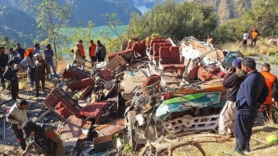 Security personnel and rescue workers gather beside the wrecked bus, subject to an accident on a remote mountain road in the Doda area, about 200 kilometres (124 miles) southeast of the Srinagar on November 15, 2023. (AFP) Security personnel and rescue workers gather beside the wrecked bus, subject to an accident on a remote mountain road in the Doda area, about 200 kilometres (124 miles) southeast of the Srinagar on November 15, 2023. (AFP)