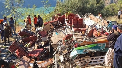 Security personnel and rescue workers gather beside the wrecked bus in Doda, Kashmir. (AFP) Security personnel and rescue workers gather beside the wrecked bus in Doda, Kashmir. (AFP)
