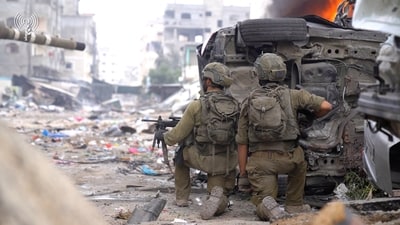 Israel-Hamas War: Israeli soldiers take positions during the ongoing ground operation of the Israeli army against Hamas. (Reuters)