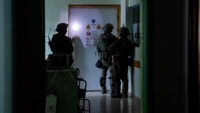 Israeli soldiers inspect the Al Shifa hospital complex, amid their ground operation against Palestinian Islamist group Hamas, in Gaza City, November 15, 2023. (via REUTERS)