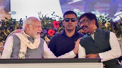 PM Narendra Modi with Jharkhand CM Hemant Soren at the function in Khunti district on Wednesday. (PTI) PM Narendra Modi with Jharkhand CM Hemant Soren at the function in Khunti district on Wednesday. (PTI)