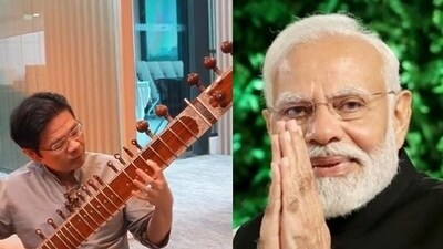 Deputy Prime Minister of Singapore playing sitar.