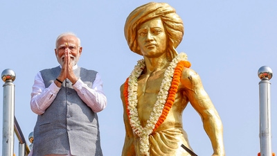 Prime Minister Narendra Modi is on a two-day visit to Jharkhand. On Wednesday, he paid homage to tribal icon Birsa Munda in Ranchi on his birth anniversary at his native village Ulihatu in Khunti district of Jharkhand. (PTI) Prime Minister Narendra Modi is on a two-day visit to Jharkhand. On Wednesday, he paid homage to tribal icon Birsa Munda in Ranchi on his birth anniversary at his native village Ulihatu in Khunti district of Jharkhand. (PTI)