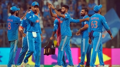 Mohammed Shami celebrates his five-wicket haul with teammates after dismissing Daryl Mitchell during the ICC Men's Cricket World Cup 2023 first semi-final match between India and New Zealand (PTI) Mohammed Shami celebrates his five-wicket haul with teammates after dismissing Daryl Mitchell during the ICC Men's Cricket World Cup 2023 first semi-final match between India and New Zealand (PTI)