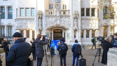 Television news crews outside of the Supreme Court, ahead of a ruling on the legality of the government's Rwanda deportation plan, in London, UK. (Bloomberg)