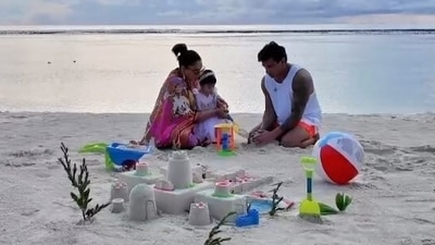 Bipasha Basu and Karan Singh Grover flew to Maldives to celebrate daughter Devi's first birthday. Sharing this picture on Instagram, Bipasha simply wrote in the caption “Beach monkeys” as she shared a glimpse from the celebrations. Bipasha Basu and Karan Singh Grover flew to Maldives to celebrate daughter Devi's first birthday. Sharing this picture on Instagram, Bipasha simply wrote in the caption “Beach monkeys” as she shared a glimpse from the celebrations. 