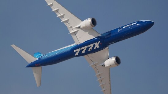 A Boeing 777X performs during the opening day of the Dubai Air Show, United Arab Emirates, Monday.(AP)