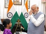 Prime Minister Narendra Modi shares a lighthearted moment with children. Prime Minister Narendra Modi shares a lighthearted moment with children.