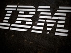 The IBM logo is displayed on the IBM building in Midtown Manhattan,