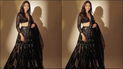 Mrunal's gorgeous black lehenga ensemble is from the shelves of clothing brand Seema Gujrat and comes with a whopping price tag of <span class='webrupee'>₹</span>1.88 lakh. (Instagram/@mrunalthakur) Mrunal's gorgeous black lehenga ensemble is from the shelves of clothing brand Seema Gujrat and comes with a whopping price tag of <span class='webrupee'>₹</span>1.88 lakh. (Instagram/@mrunalthakur)