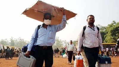 Polling officials carrying the election materials for their election duty on the eve of the Madhya Pradesh Assembly elections (ANI) Polling officials carrying the election materials for their election duty on the eve of the Madhya Pradesh Assembly elections (ANI)