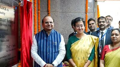Delhi lieutenant governor VK Saxena and education minister Atishi at the inauguration at the Delhi Technological University on Thursday. (ANI)