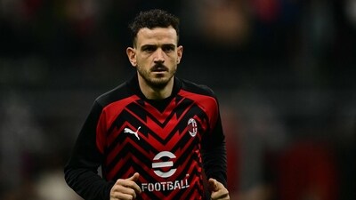 AC Milan's Italian defender #42 Alessandro Florenzi warms up before the Italian Serie A football match between Milan and Juventus at San Siro Stadium (AFP)