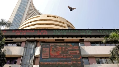 A bird flies past a screen displaying the Sensex results on the facade of the Bombay Stock Exchange (BSE) building in Mumbai, February 1. (REUTERS)