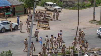Nuh Superintendent of Police Narender Bijarniya, along with a huge police force, reached the spot and dispersed the gathering (File image/ PTI) Nuh Superintendent of Police Narender Bijarniya, along with a huge police force, reached the spot and dispersed the gathering (File image/ PTI)
