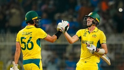 Australia's captain Pat Cummins and Mitchell Starc celebrate after winning the ICC Men's Cricket World Cup 2023 second semi-final match against South Africa, at the Eden Gardens Stadium, in Kolkata, Thursday (PTI) Australia's captain Pat Cummins and Mitchell Starc celebrate after winning the ICC Men's Cricket World Cup 2023 second semi-final match against South Africa, at the Eden Gardens Stadium, in Kolkata, Thursday (PTI)