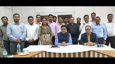 Postmaster General (PMG) of Prayagraj Region Krishna Kumar Yadav with postal officials in Prayagraj on Thursday. (HT) Postmaster General (PMG) of Prayagraj Region Krishna Kumar Yadav with postal officials in Prayagraj on Thursday. (HT)