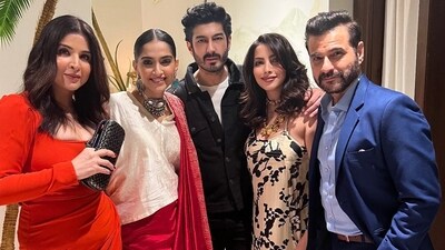 Maheep Kapoor, Sanjay Kapoor, Mohit Marwah and his wife Antara Motiwala Marwah pose with Sonam Kapoor at her party for football legend David Bekcham in Mumbai on Wednesday.&nbsp; 
